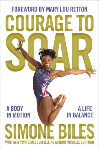 Book cover of Courage to Soar: A body in Motion, a Life in Balance. Simone Biles, a young black woman holds a pose with her arms stretched wide and her legs and feet tucked behind her in mid-air. She is wearing a blue and white leotard and is smiling. 